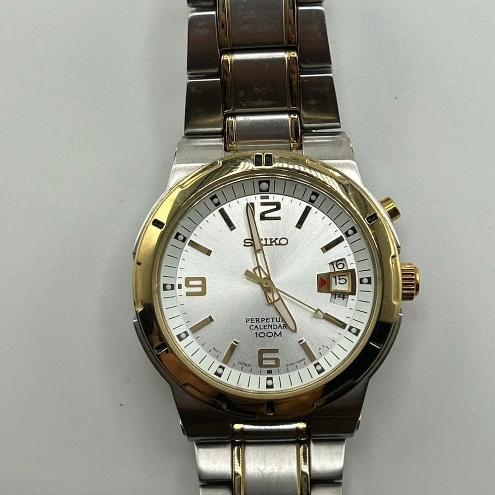 Seiko Men's SNQ076 Perpetual Calendar Two-Tone Watch #555